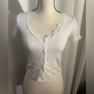 Lace trimmed buttoned white shirt